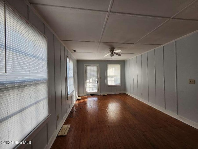 interior space featuring wood-type flooring and ceiling fan