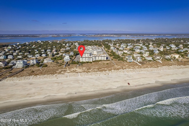 aerial view featuring a water view and a beach view