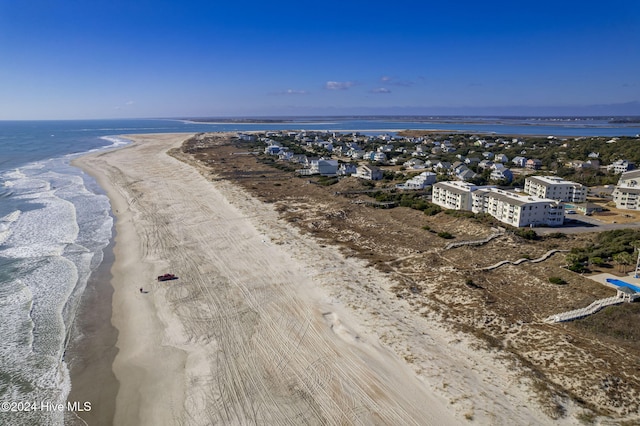 drone / aerial view with a view of the beach and a water view