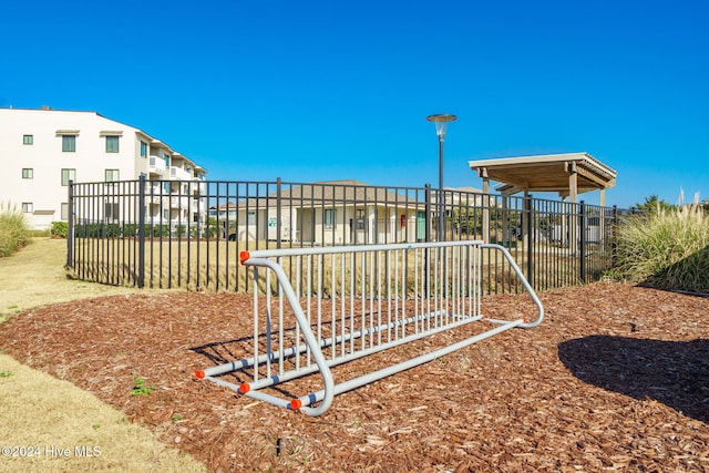 view of property's community with a playground