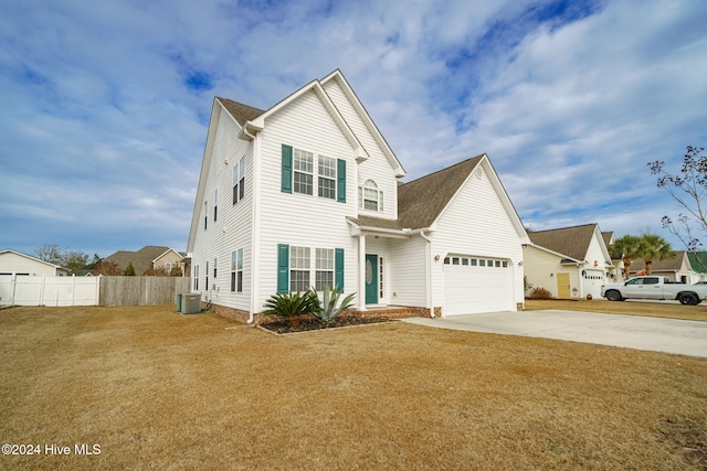 view of front of house featuring a garage and central air condition unit