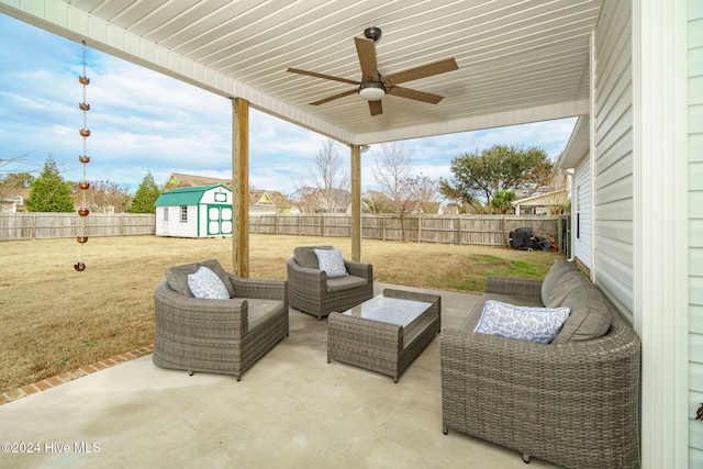 view of patio / terrace featuring a storage shed