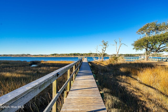 view of dock with a water view