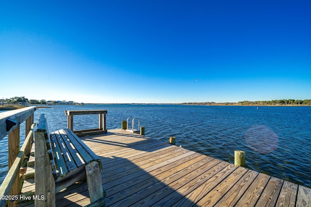 view of dock with a water view