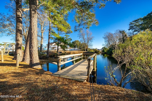 view of dock with a water view