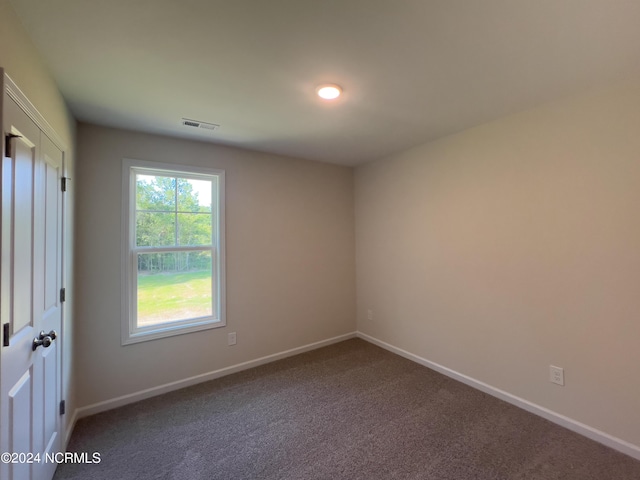 spare room featuring carpet flooring