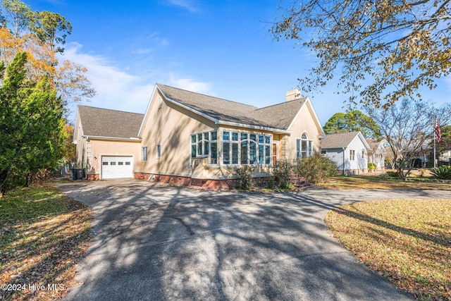 view of front of property featuring a garage