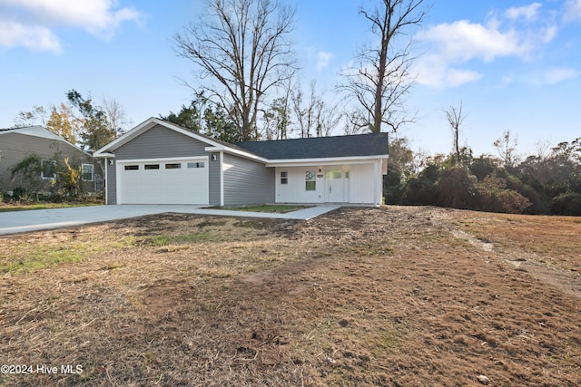 ranch-style home with a garage