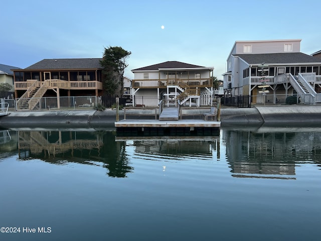 dock area featuring a water view