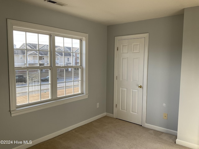 view of carpeted spare room