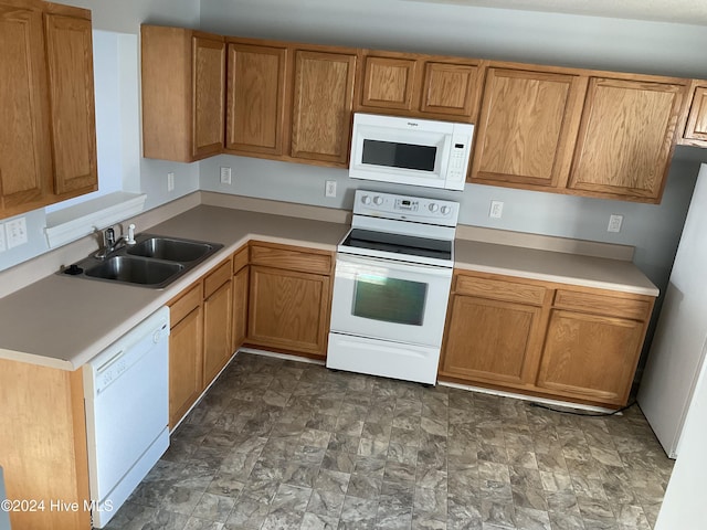 kitchen with sink and white appliances