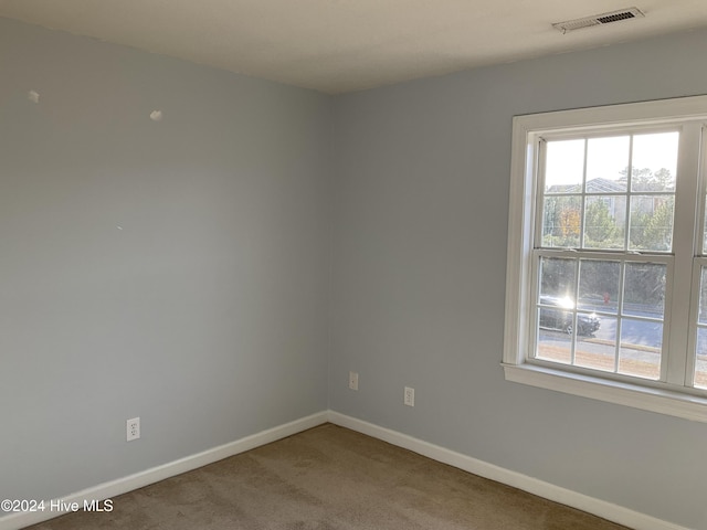 view of carpeted spare room