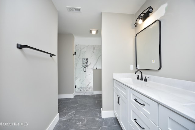 bathroom featuring vanity and walk in shower