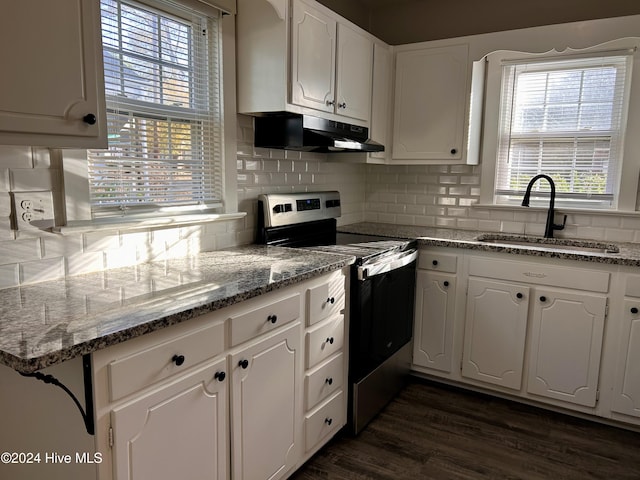 kitchen with stainless steel range, white cabinetry, dark wood-type flooring, and sink