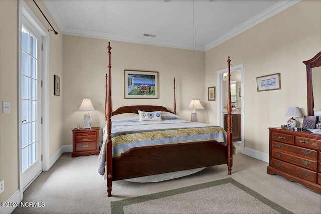 bedroom with connected bathroom, light carpet, and crown molding