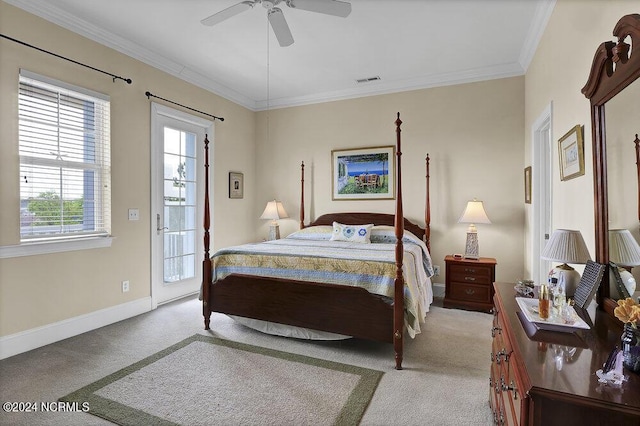 carpeted bedroom featuring ceiling fan and ornamental molding