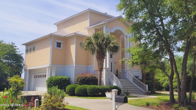 view of front of property featuring a garage