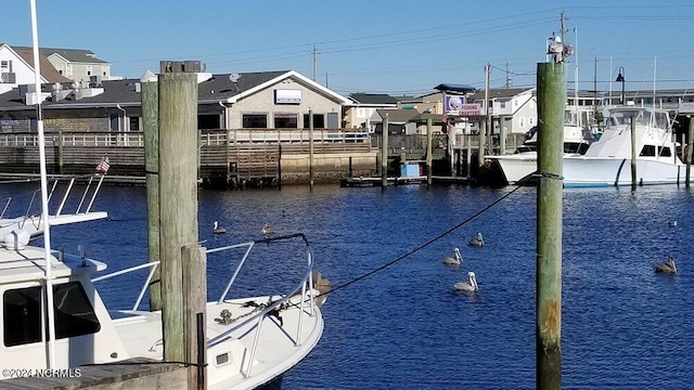 view of dock with a water view