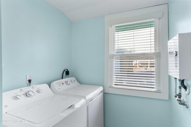 washroom featuring washer and clothes dryer