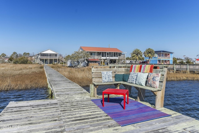 dock area featuring a water view