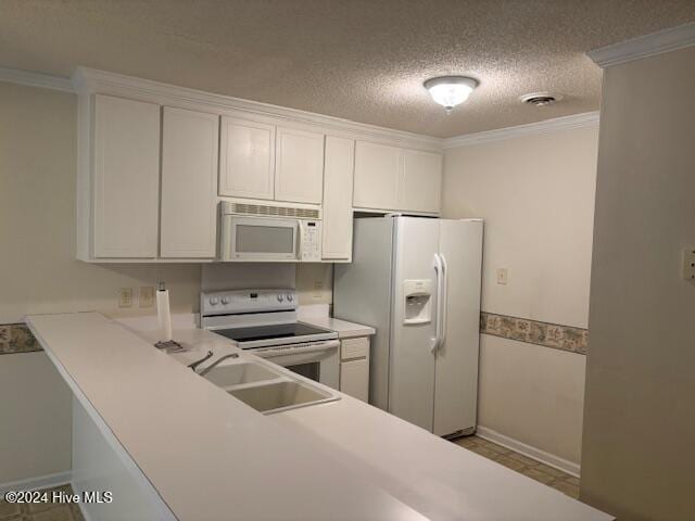 kitchen with sink, crown molding, a textured ceiling, white appliances, and white cabinets