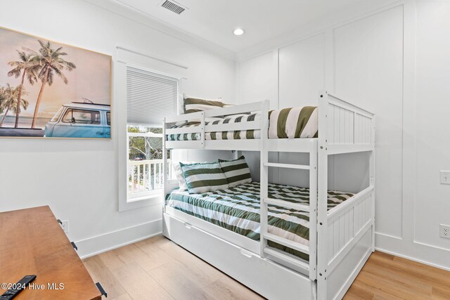 bedroom featuring hardwood / wood-style floors