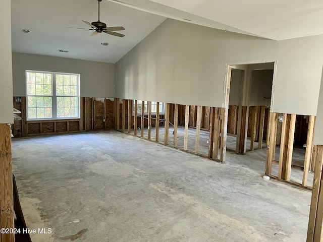 spare room featuring ceiling fan and high vaulted ceiling