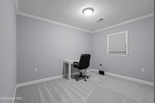 carpeted office with a textured ceiling and ornamental molding