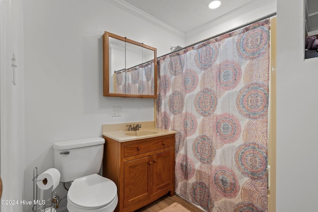 bathroom featuring walk in shower, toilet, vanity, and ornamental molding