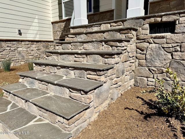 details featuring stone siding