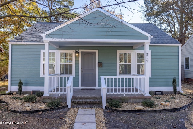 bungalow-style house featuring covered porch