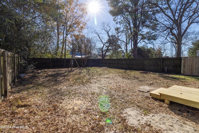 view of yard with a deck