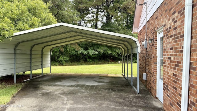 1394 Lake Cole Rd, Midway Park, NC 28544 - view of parking / parking lot featuring a detached carport and driveway