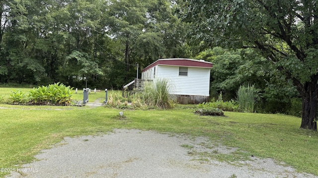 1394 Lake Cole Rd, Midway Park, NC 28544 - view of green lawn