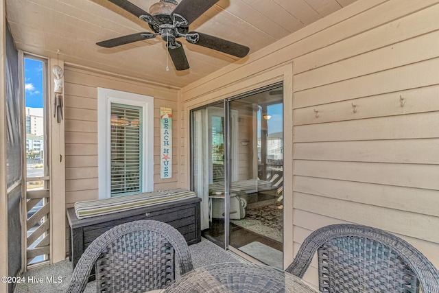 view of patio featuring ceiling fan