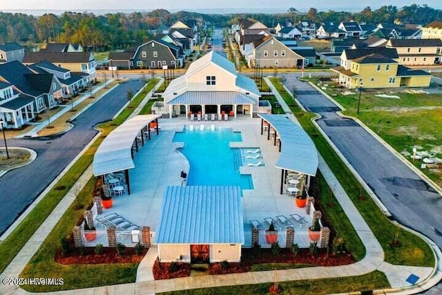 view of pool featuring a residential view