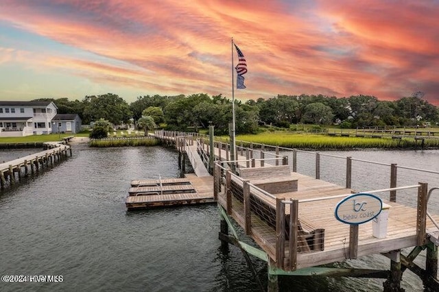 dock area featuring a water view