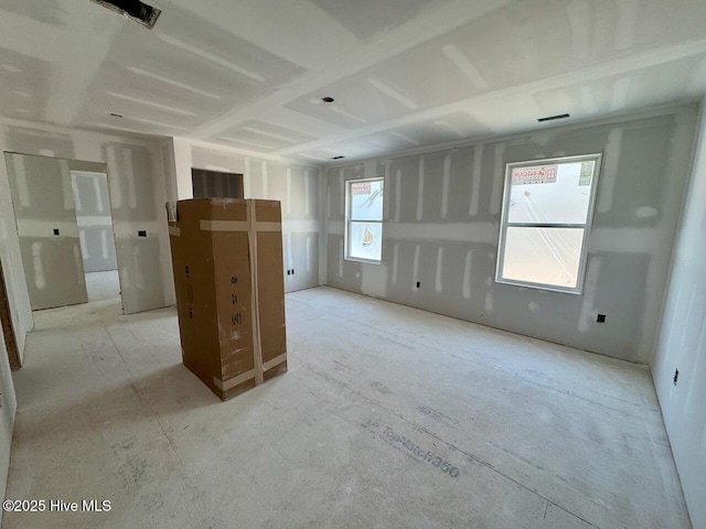 spare room featuring visible vents