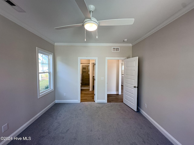 walk in closet featuring carpet flooring