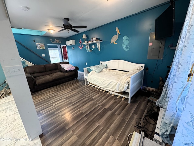 bedroom featuring electric panel, dark hardwood / wood-style floors, a wall unit AC, and ceiling fan