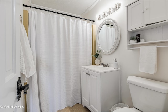 bathroom with toilet, curtained shower, ornamental molding, and vanity