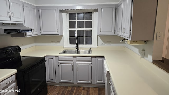 kitchen featuring sink, dark hardwood / wood-style flooring, black electric range oven, extractor fan, and gray cabinets