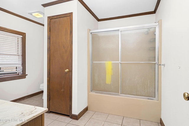 full bathroom with toilet, tile patterned flooring, bath / shower combo with glass door, crown molding, and vanity