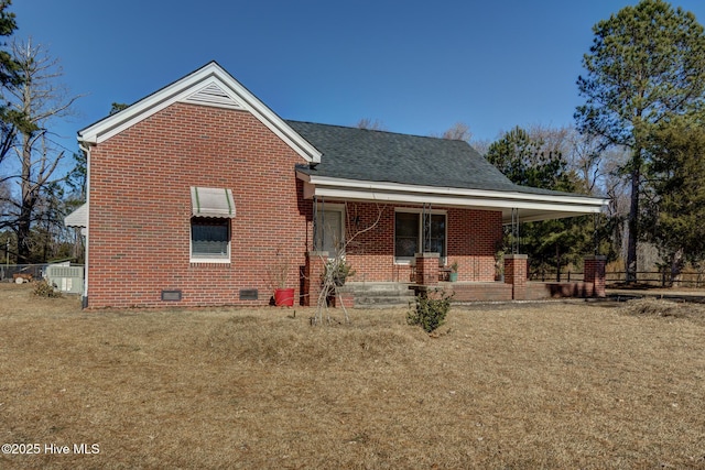 view of front of house featuring a front yard and a porch