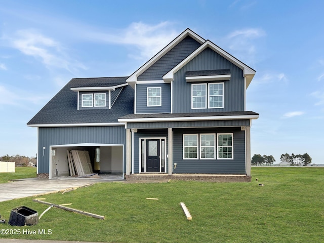 view of front of house featuring a front yard and a carport