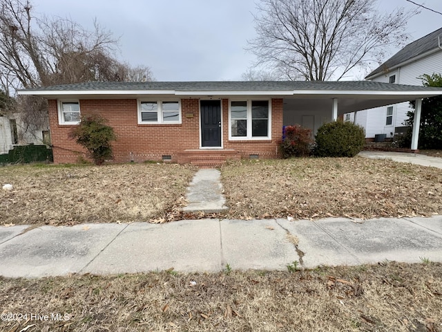 single story home with a carport