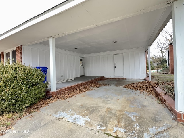 exterior space with a carport