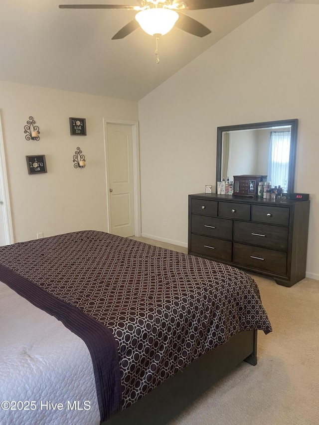 49 Patrick Henry Cir NW, Supply, NC 28462 - bedroom featuring light carpet, lofted ceiling, baseboards, and ceiling fan