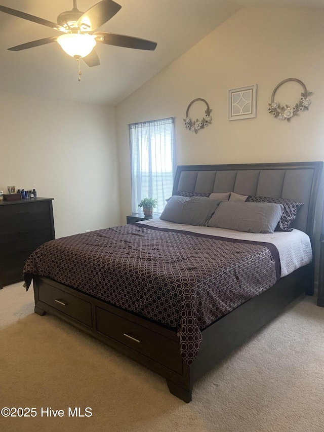 49 Patrick Henry Cir NW, Supply, NC 28462 - bedroom featuring light carpet, vaulted ceiling, and a ceiling fan