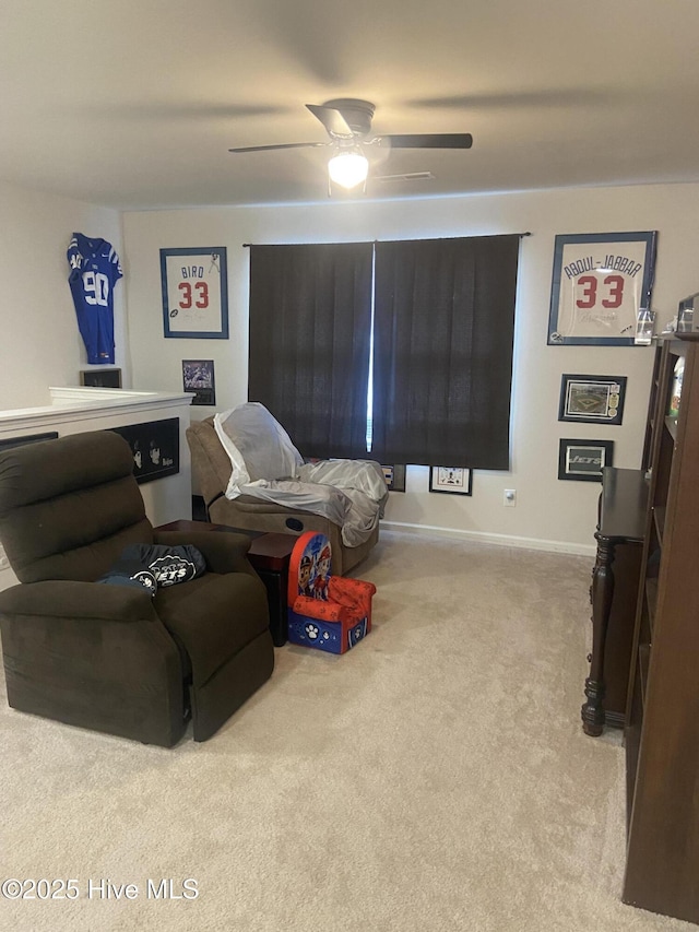 49 Patrick Henry Cir NW, Supply, NC 28462 - living area featuring carpet, a ceiling fan, and baseboards